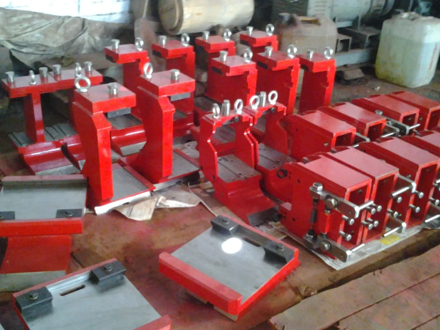 Batch of block guide stands and housings on the shop floor