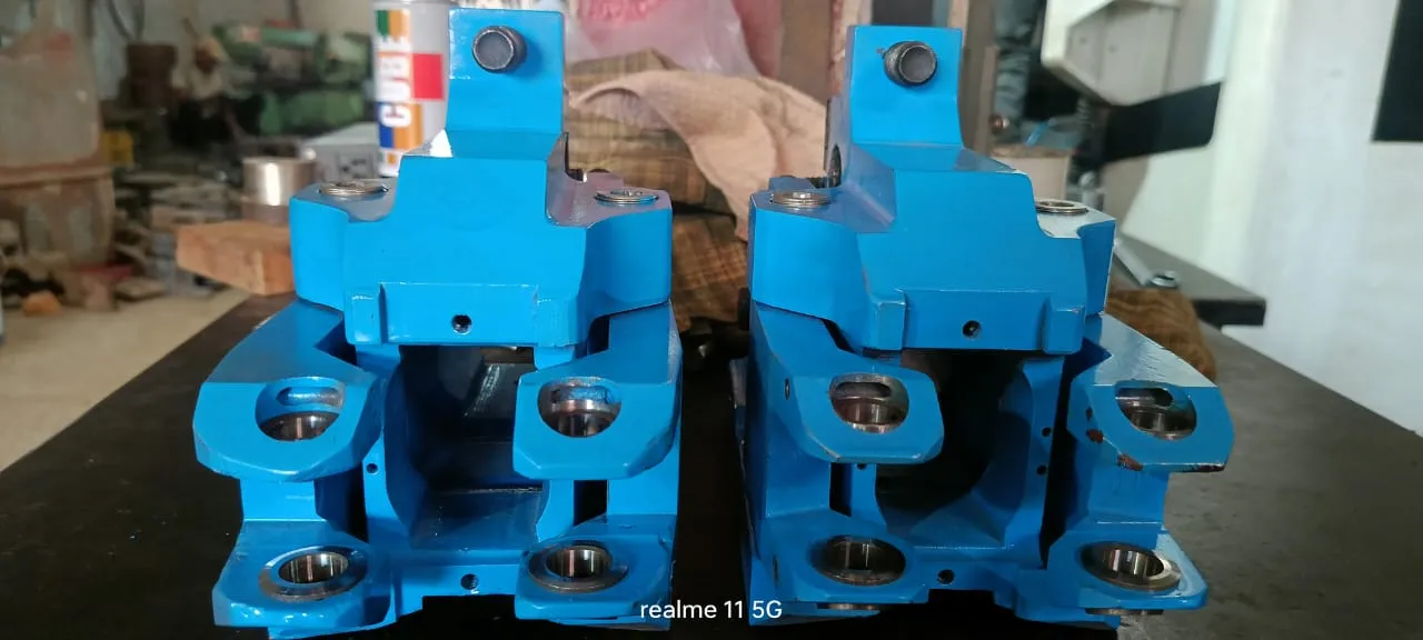 Pair of entry guides opened to show the roller arrangement