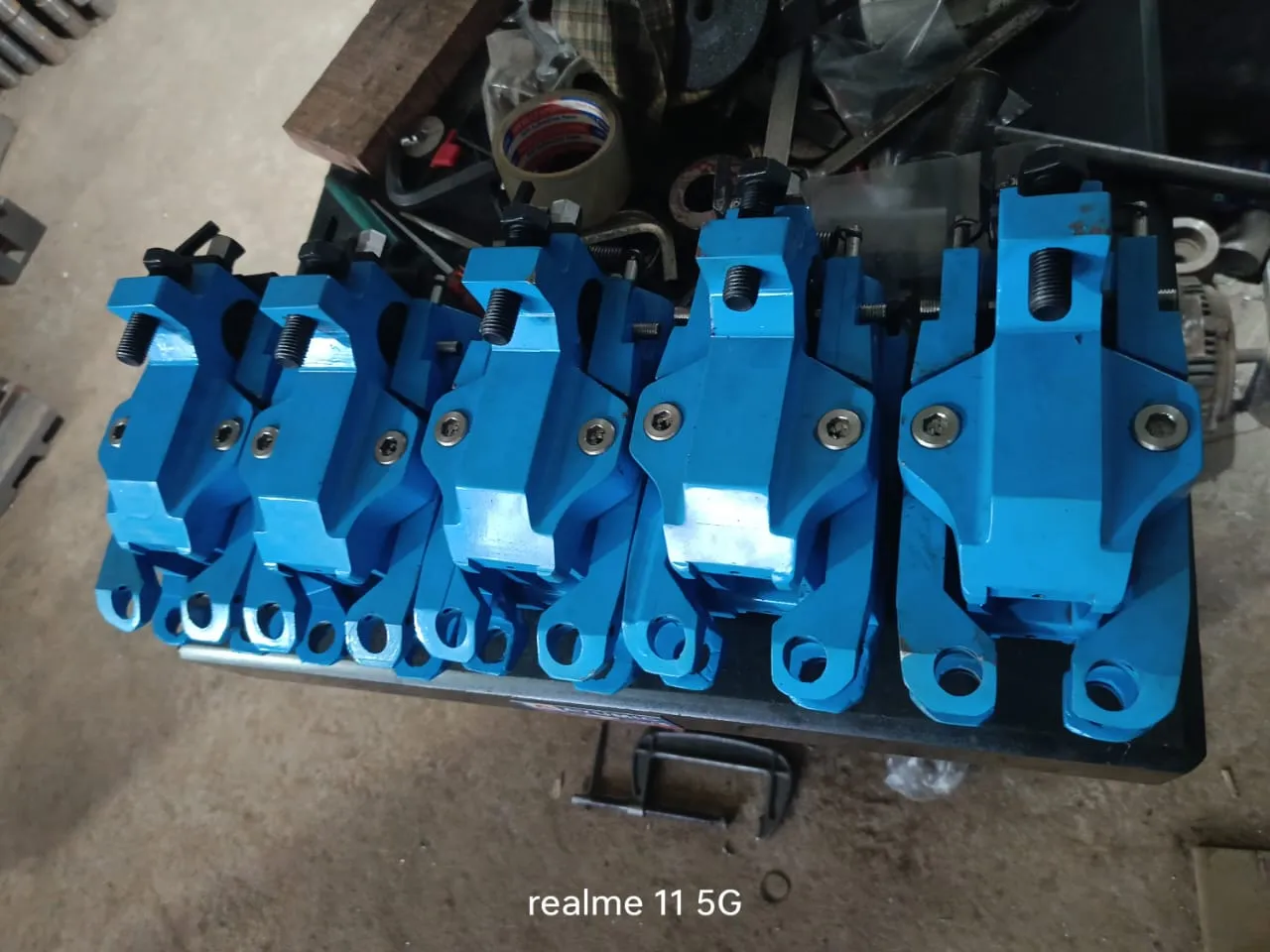 Row of entry guide assemblies prepared for fitting